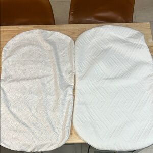 Two Halo Bassinet mattress covers
